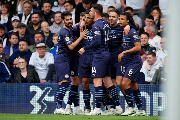 Man City and Liverpool win in tight Premier League title race